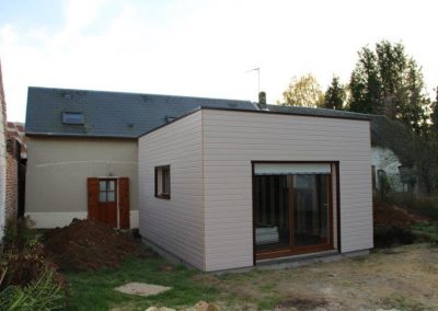 Extension arrière d'une maison ancienne avec toiture terrassse membrane EPDM